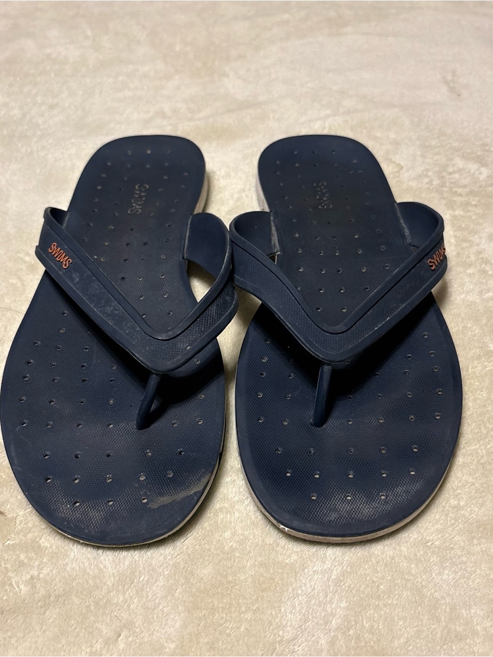 Swims Men’s Navy Flip Flops with Orange Logo Accent